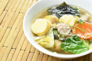 boiled egg tofu with minced pork and cabbage topping seaweed soup on bowl