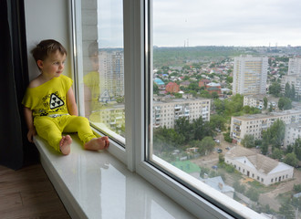 little boy and window