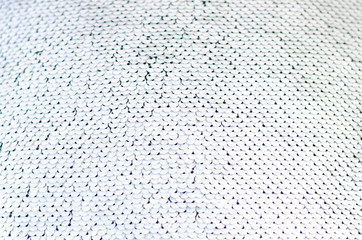 Fabric texture with shimmering silver sequins.