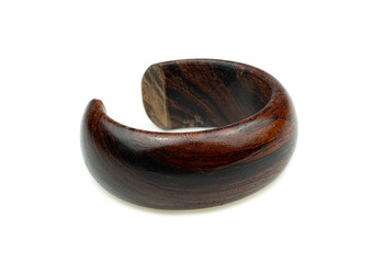 Old bangle made rosewood on isolated white background