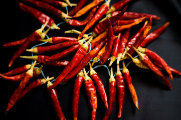 Red hot pepper on a black background