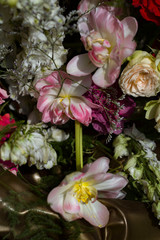 composition of pink and white roses on a blurred background