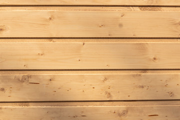 Wall of polished wooden boards