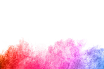 abstract powder splatted background. Colorful powder explosion on white background. Colored cloud. Colorful dust explode. Paint Holi.