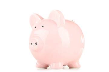 Pink piggy bank isolated on white background