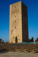 hundreds of golden chairs standing in front of the Hassan Tower during the reception of the Pope in March 2019 in Rabat, Morocco