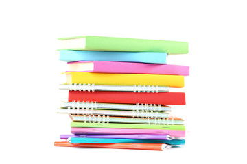 School books and notebooks on white background