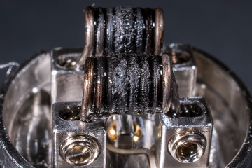 Deteriorated vaping coils. RDA. Vape mod