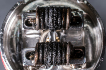 Deteriorated vaping coils. RDA. Vape mod