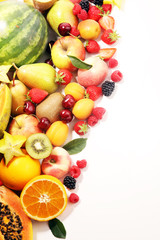 Fresh summer fruits with apple, peach, papaya, berries, pear and apricot.