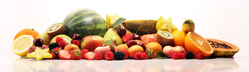 Fresh summer fruits with apple, peach, papaya, berries, pear and apricot.