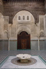 Fez, Morocco - March 25th, 2019: Inside interior of The Madrasa Bou Inania; acknowledged as an excellent example of Marinid architecture. Medina of Fez.