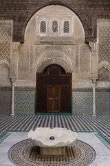 Fez, Morocco - March 25th, 2019: Inside interior of The Madrasa Bou Inania; acknowledged as an excellent example of Marinid architecture. Medina of Fez.
