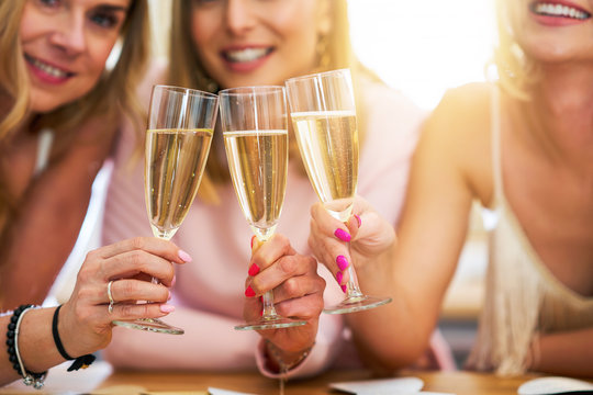 Picture presenting happy group of friends celebrating together - Powered by Adobe