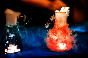 Glass flasks with chemical reaction - 270078896