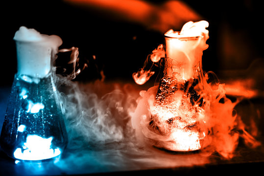 Glass flasks with chemical reaction