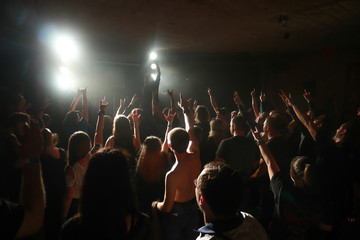 Fototapeta na wymiar Crowd at concert in rock club
