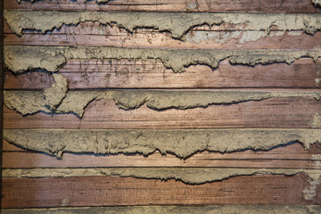 Detail of lath and plaster on an old wall