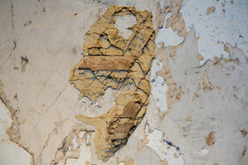 Detail of lath and plaster on an old wall
