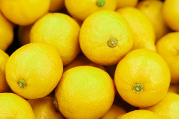 Citrus yellow fresh lemon close-up by group