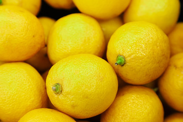 Citrus yellow fresh lemon close-up by group