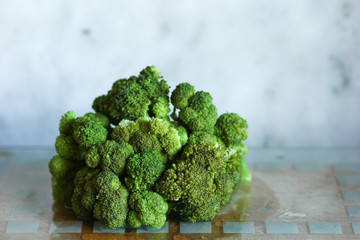Head of cooked broccoli cabbage on the table 