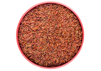Fototapeta na wymiar Red bowl of raw organic red rice on white background. Healthy food.