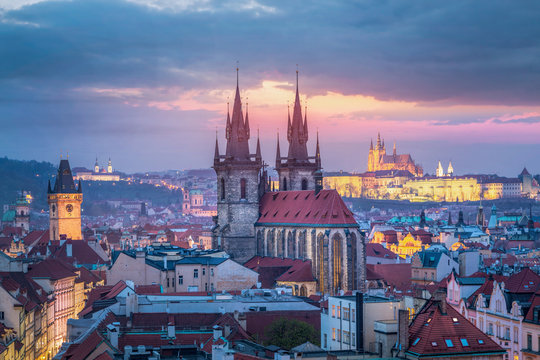 Fototapeta View over Prague old town at night with Tyn church and castle
