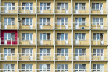 Fototapeta premium An apartment building wall texture. Architecture background of building walls.