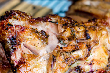 Obraz na płótnie Canvas grilled chicken thigh closeup