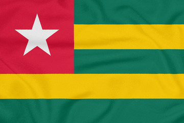 Flag of Togo on textured fabric. Patriotic symbol