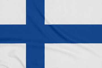 Flag of Finland on textured fabric. Patriotic symbol