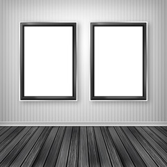 Gallery interior with two empty frames on wall