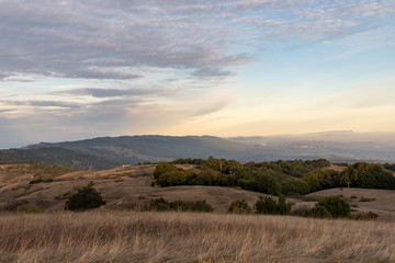 Obraz premium Sunset on silicon valley as seen from the top of Monte Bello open space above Palo Alto, California