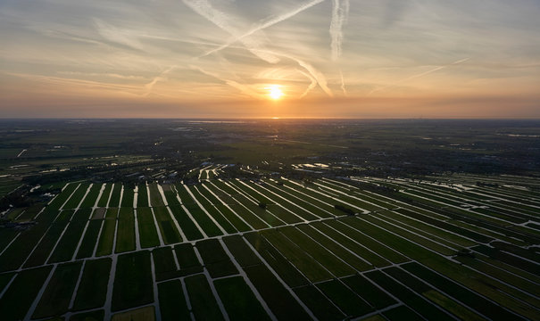 Aerial view of cultivated reclaimed land in the Netherlands at sunset