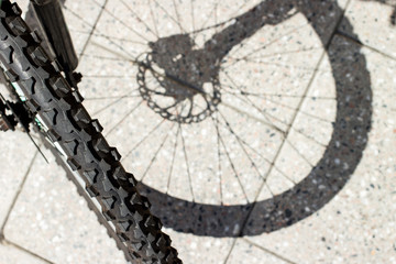 Fototapeta na wymiar Bicycle wheel and tyre part grunge background