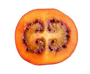 Fresh tamarillo half fruit isolated on white background
