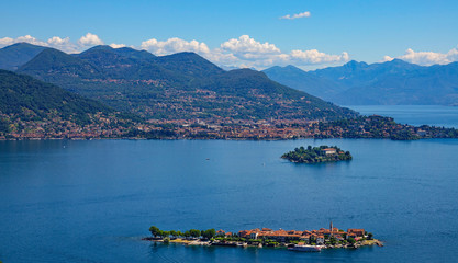DRONE: Picturesque view of two small islands in the middle of lake Maggiore.