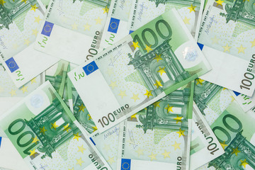 Many Banknotes of 100 Euro, the European currency background