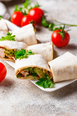 Fototapeta na wymiar Lavash rolls with chicken and vegetables