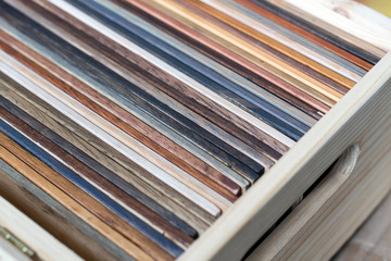 Samples of different kinds of wood in a box