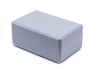 Grey Yoga Block isolated on white background.