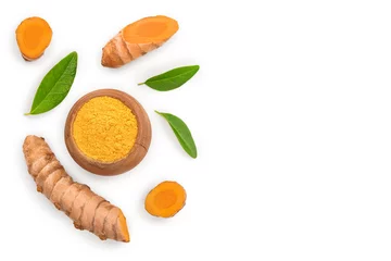 Fotobehang Turmeric powder and turmeric root isolated on white background with copy space for your text. Top view. Flat lay © kolesnikovserg