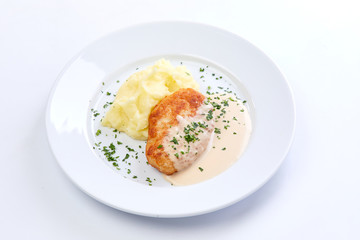 cutlet with mashed potato on the white background