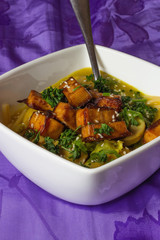 Stewed mushrooms with smoked tofu vertical view