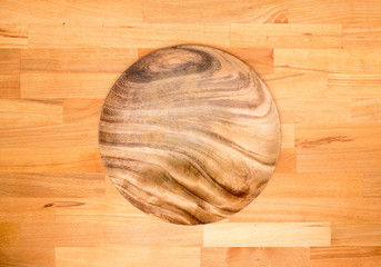 Empty Wooden Plate on Wooden Background