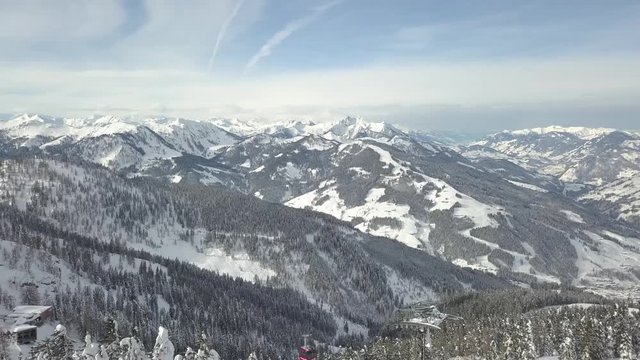 Aerial panoramic view of the mountains in Flachau, Austria during sunset