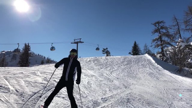 Panoramic view of the charlifts in the ski resort of Flachau, Austria during sunset