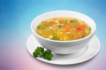 Bowl of vegetables delicious soup, close-up view