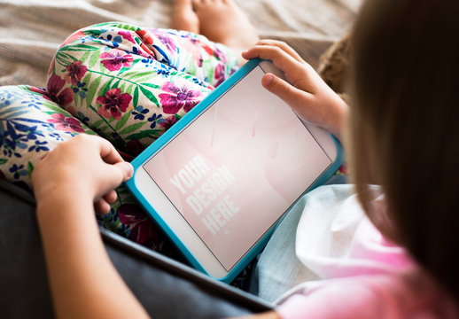 Young Child Using Tablet Mockup